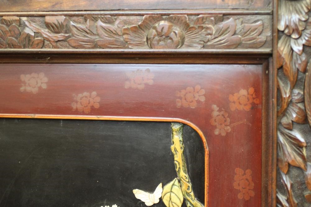 A CHINESE PADOUK WOOD AND IVORY FOLDING ROOM SCREEN Image