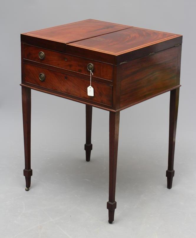 A GEORGIAN MAHOGANY KNEEHOLE DRESSING CHEST Image
