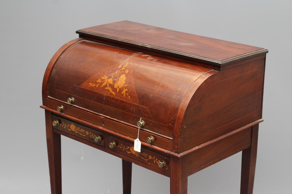 AN EDWARDIAN MAHOGANY CYLINDER BUREAU Image