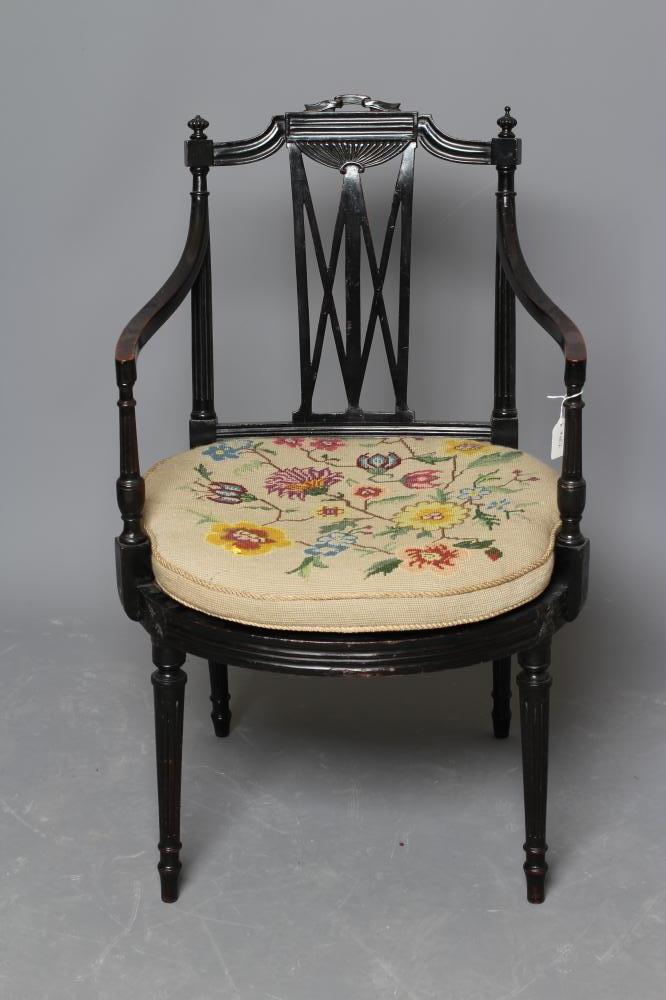 AN EBONISED BEECH ELBOW CHAIR of Georgian design Image