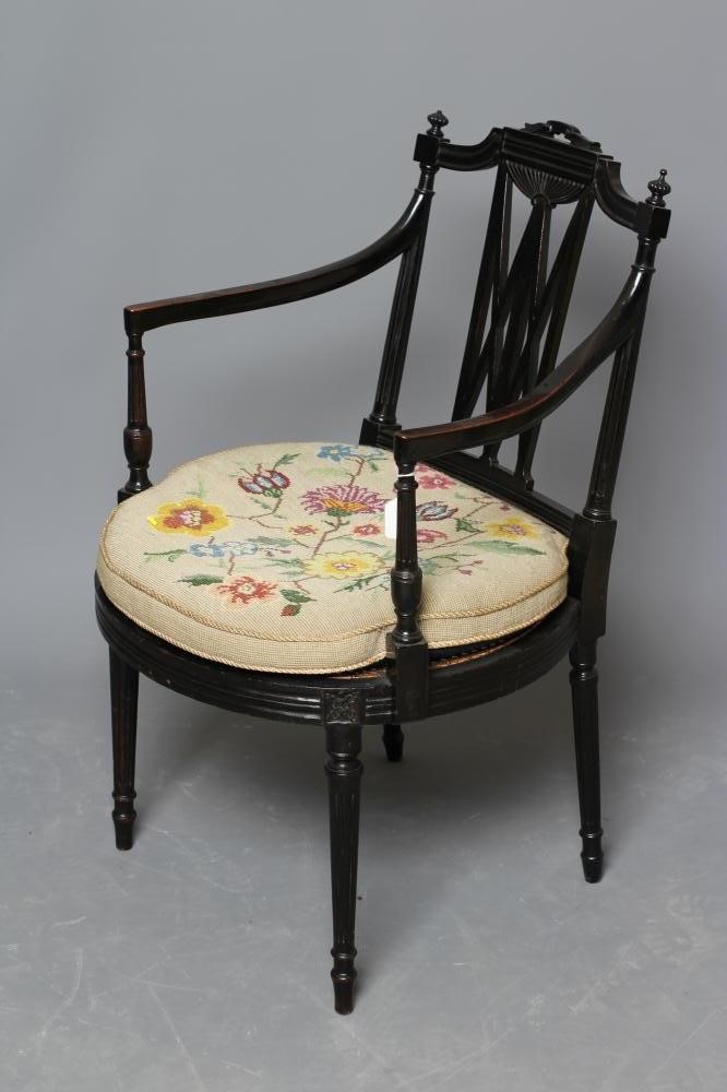 AN EBONISED BEECH ELBOW CHAIR of Georgian design Image