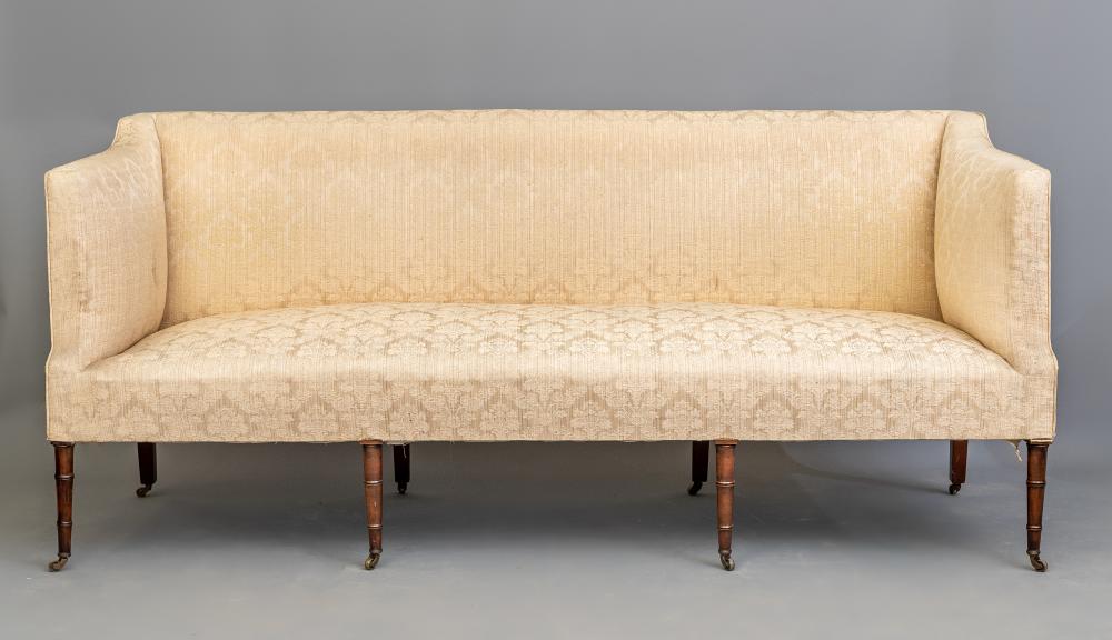 A REGENCY MAHOGANY FRAMED SOFA upholstered in champagne silk brocade Image