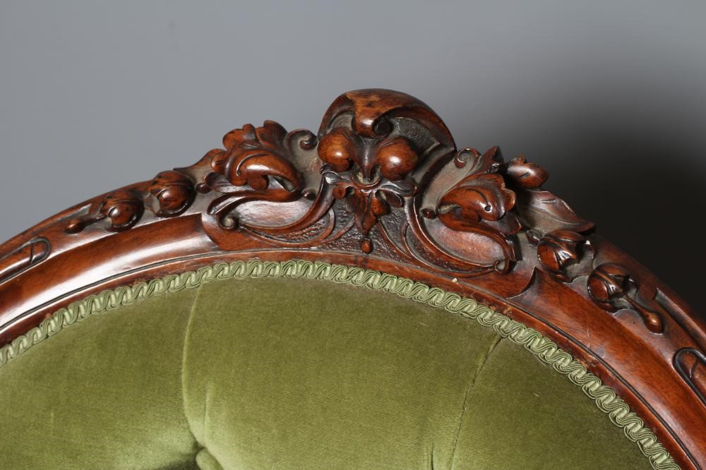 A VICTORIAN WALNUT FRAMED SALON CHAIR of spoonback form Image