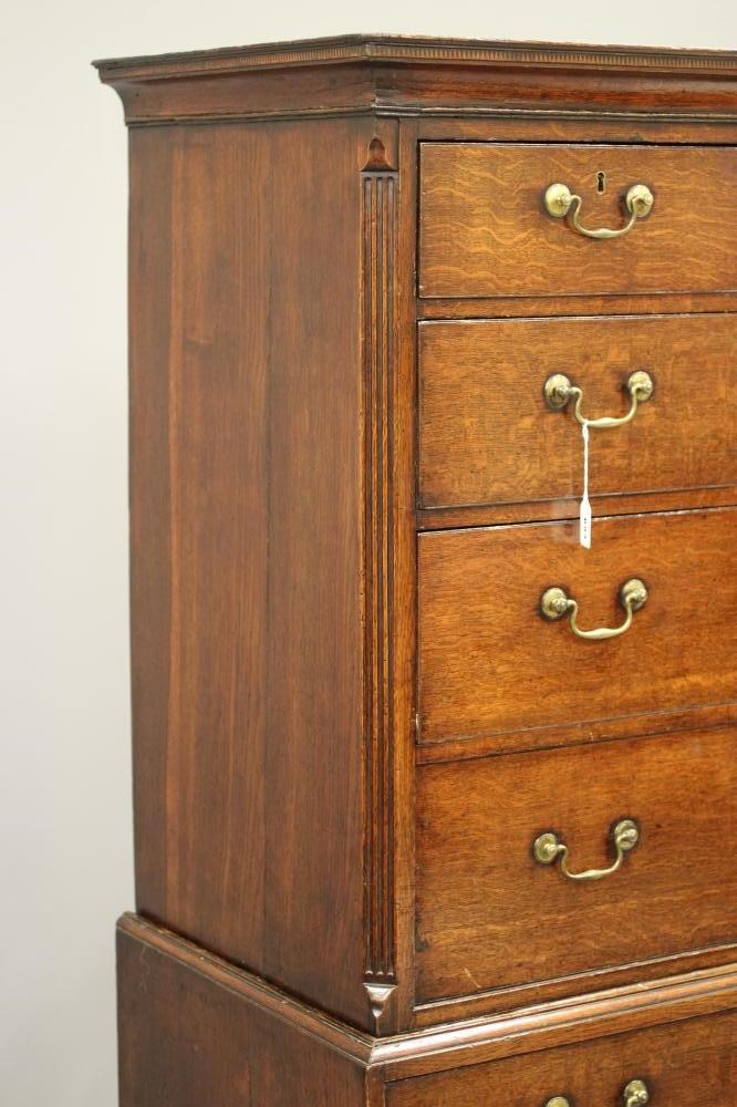 A GEORGIAN OAK CHEST ON CHEST Image