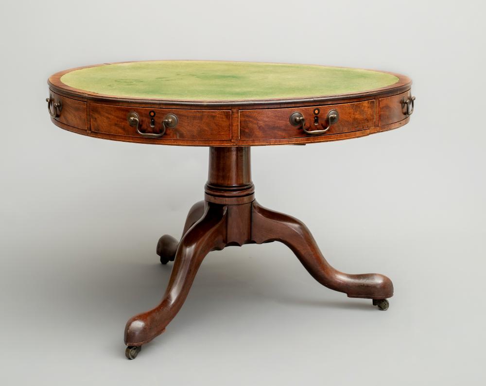 A GEORGIAN MAHOGANY LIBRARY DRUM TABLE Image