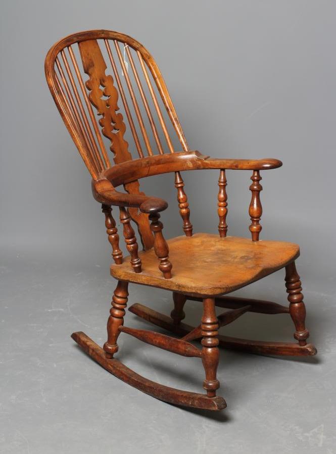 A YORKSHIRE YEW AND ASH WINDSOR ROCKING CHAIR Image