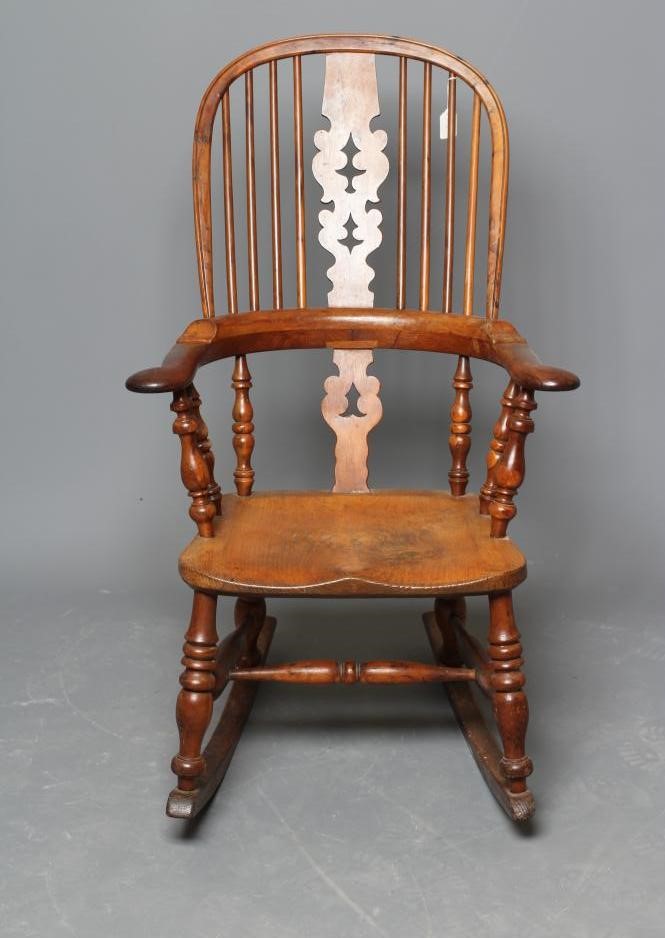 A YORKSHIRE YEW AND ASH WINDSOR ROCKING CHAIR Image