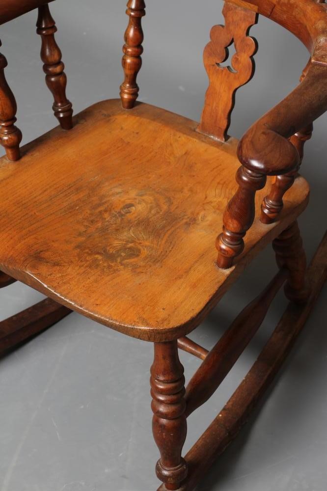 A YORKSHIRE YEW AND ASH WINDSOR ROCKING CHAIR Image