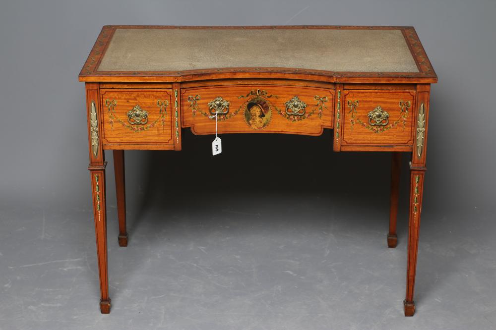 AN EDWARDIAN PAINTED SATINWOOD KNEEHOLE DESK of oblong form with stringing Image