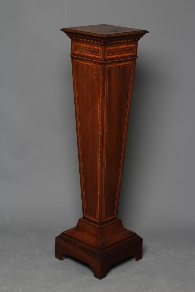 AN EDWARDIAN MAHOGANY PEDESTAL of square tapering form with stringing and satinwood banding Image