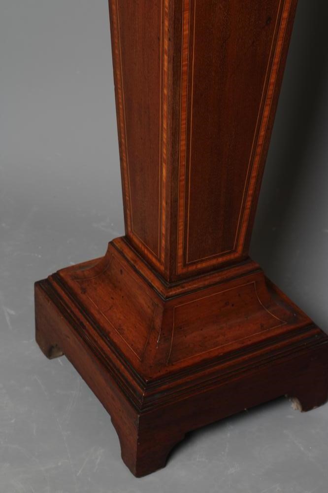 AN EDWARDIAN MAHOGANY PEDESTAL of square tapering form with stringing and satinwood banding Image