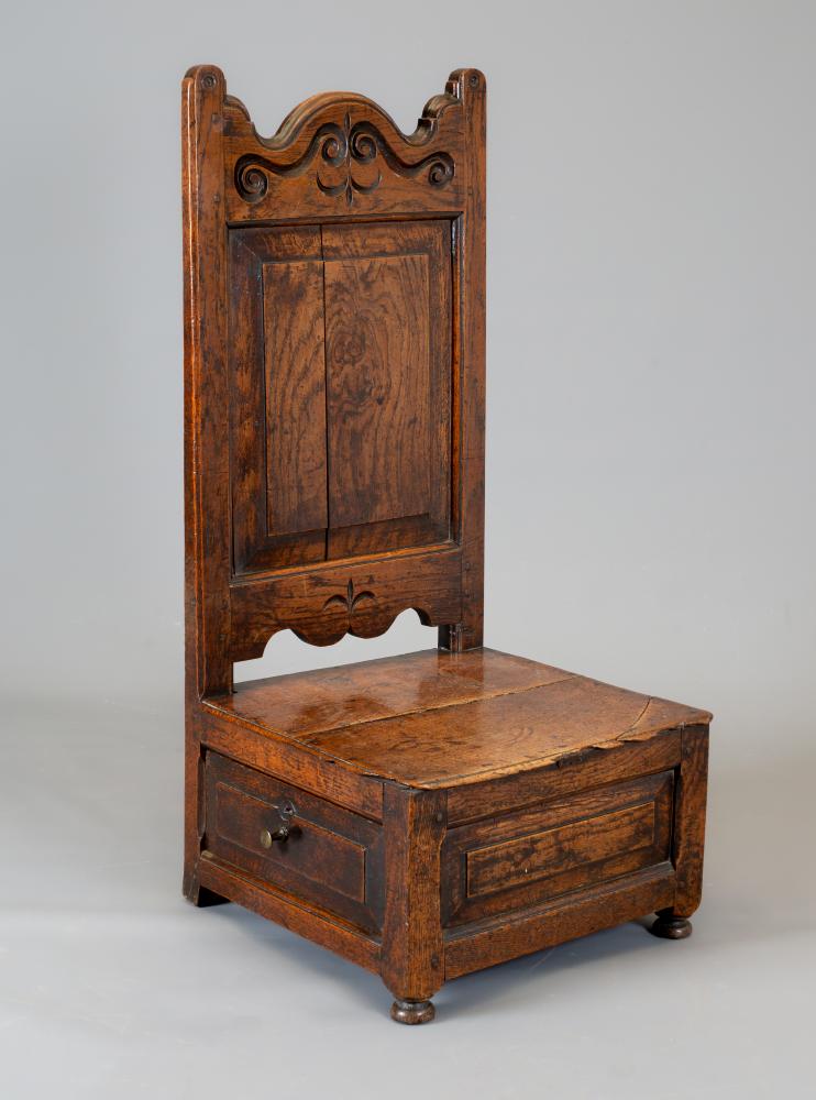 A JOINED OAK NURSING CHAIR Image