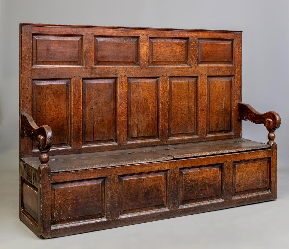 A GEORGIAN OAK HIGH BACK BOX SETTLE Image
