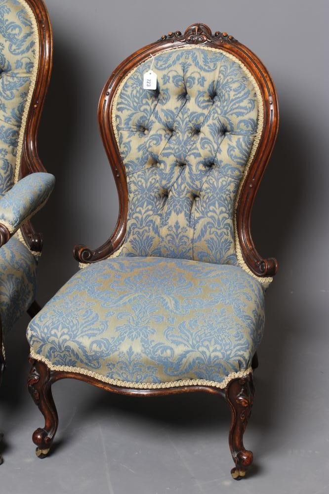 A PAIR OF VICTORIAN CARVED WALNUT SALON CHAIRS Image