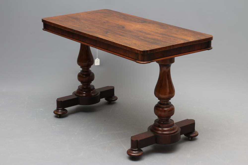 A VICTORIAN ROSEWOOD LIBRARY TABLE Image