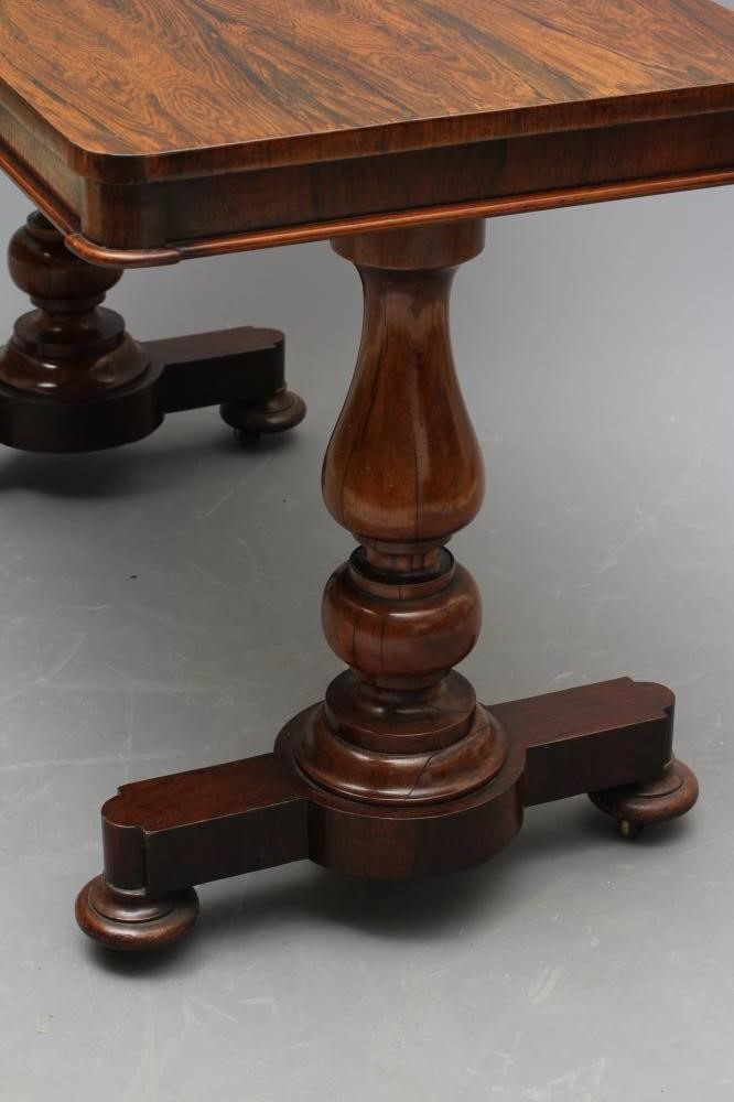 A VICTORIAN ROSEWOOD LIBRARY TABLE Image