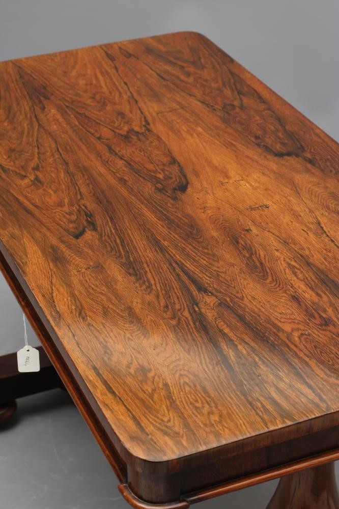 A VICTORIAN ROSEWOOD LIBRARY TABLE Image