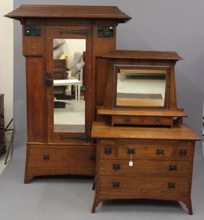 AN ARTS AND CRAFTS OAK TWO PIECE BEDROOM SUITE by Maple & Co. Image