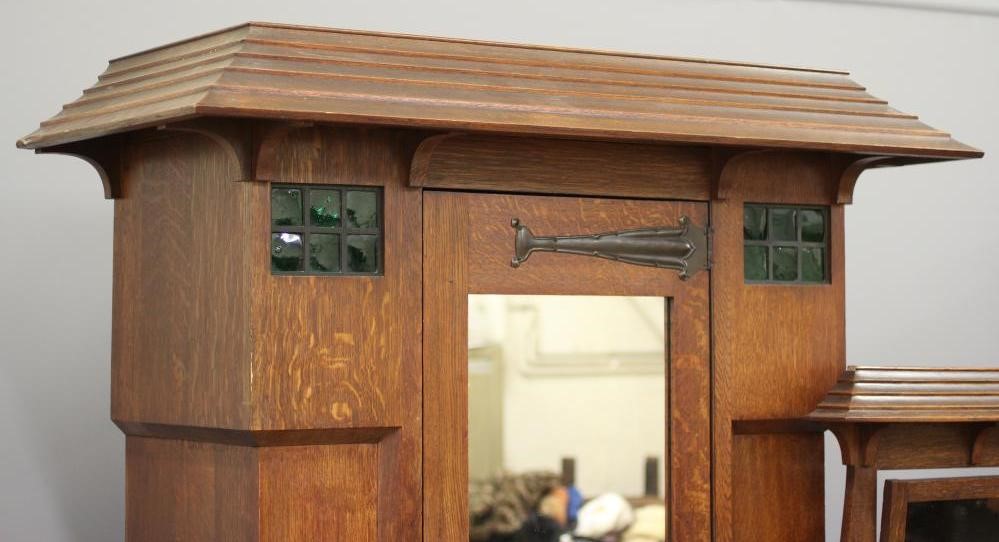 AN ARTS AND CRAFTS OAK TWO PIECE BEDROOM SUITE by Maple & Co. Image