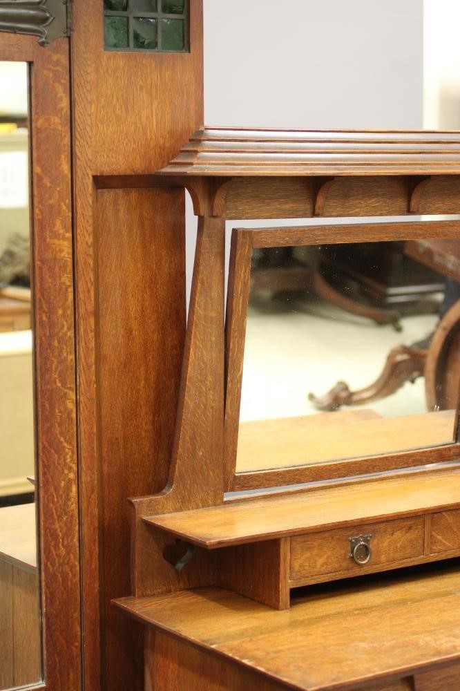 AN ARTS AND CRAFTS OAK TWO PIECE BEDROOM SUITE by Maple & Co. Image