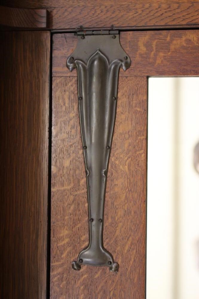 AN ARTS AND CRAFTS OAK TWO PIECE BEDROOM SUITE by Maple & Co. Image