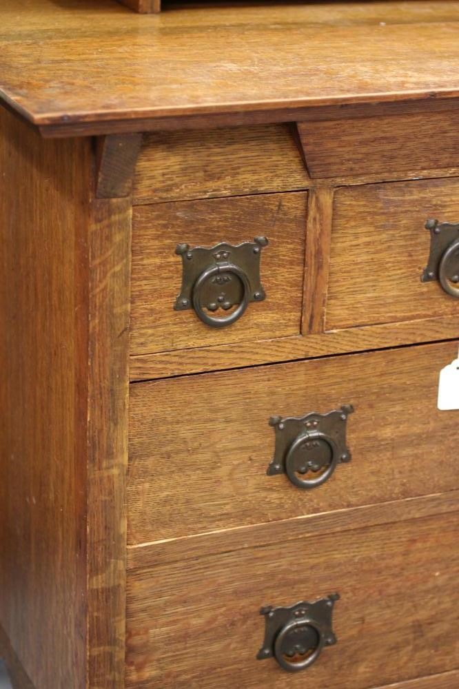 AN ARTS AND CRAFTS OAK TWO PIECE BEDROOM SUITE by Maple & Co. Image