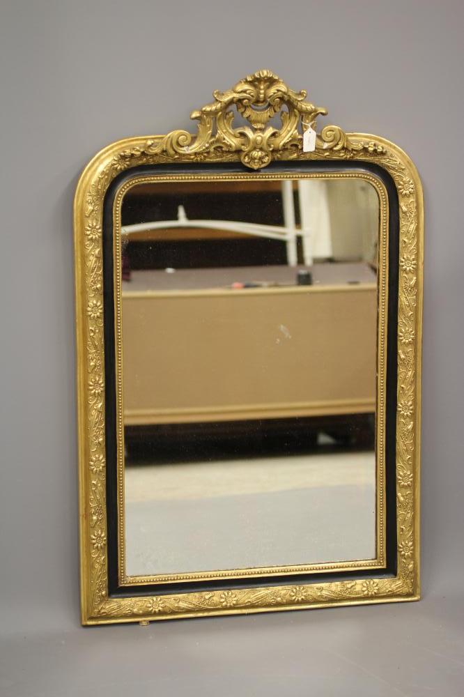 A VICTORIAN GILT GESSO AND EBONISED PIER GLASS Image