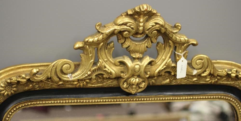 A VICTORIAN GILT GESSO AND EBONISED PIER GLASS Image