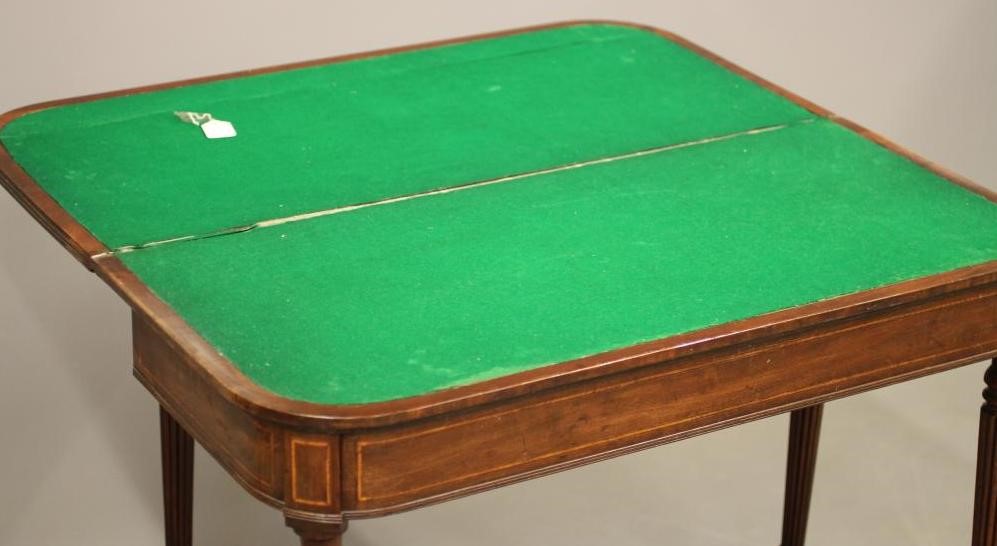 A MAHOGANY FOLDING CARD TABLE in the manner of Gillow Image