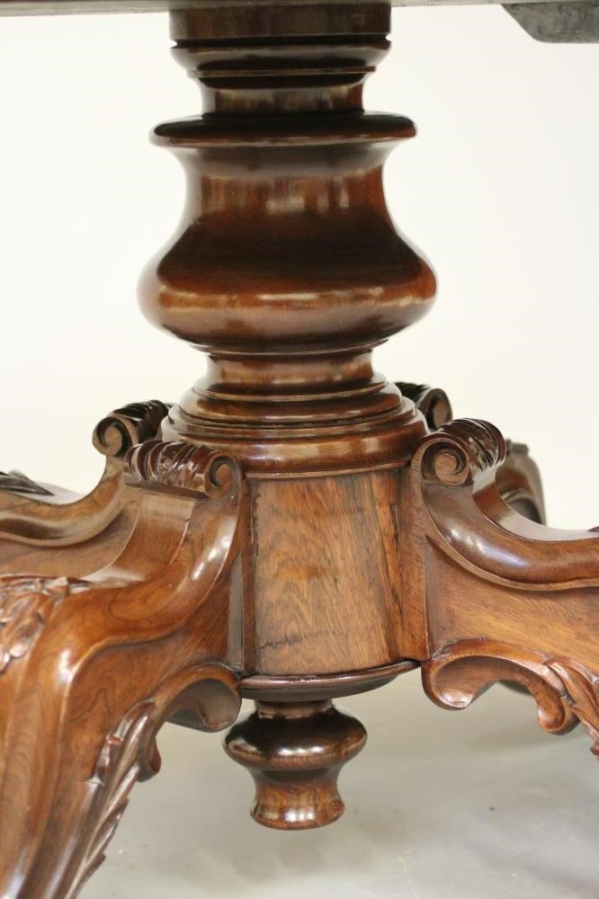 A VICTORIAN ROSEWOOD LOO TABLE of serpentine oval form Image