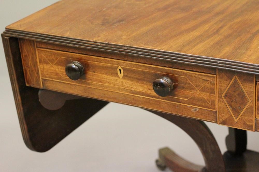 A LATE GEORGIAN MAHOGANY SOFA TABLE Image