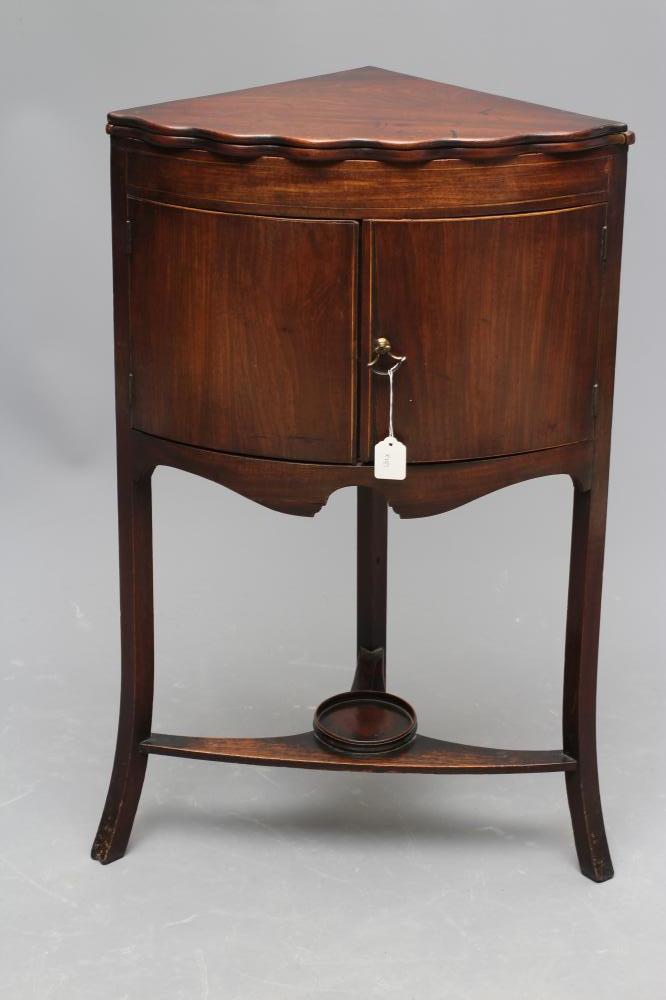 A GEORGIAN MAHOGANY WASHSTAND of quadrant form with stringing Image