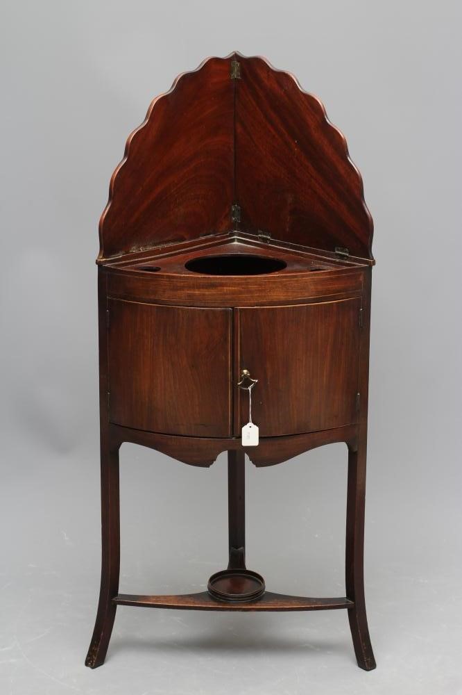 A GEORGIAN MAHOGANY WASHSTAND of quadrant form with stringing Image