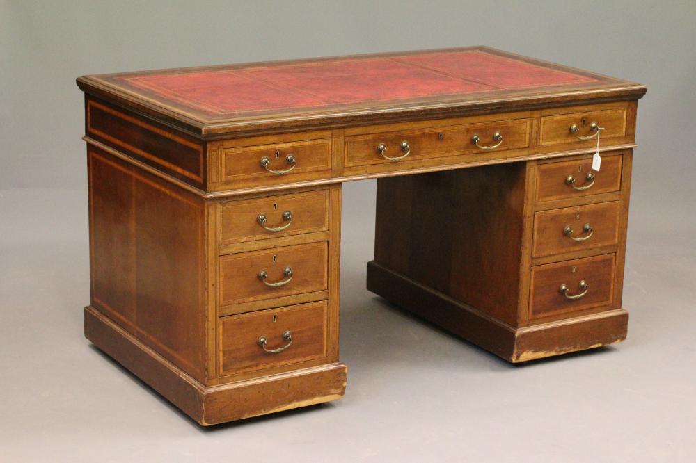 AN EDWARDIAN MAHOGANY PEDESTAL DESK with satinwood banding and stringing Image