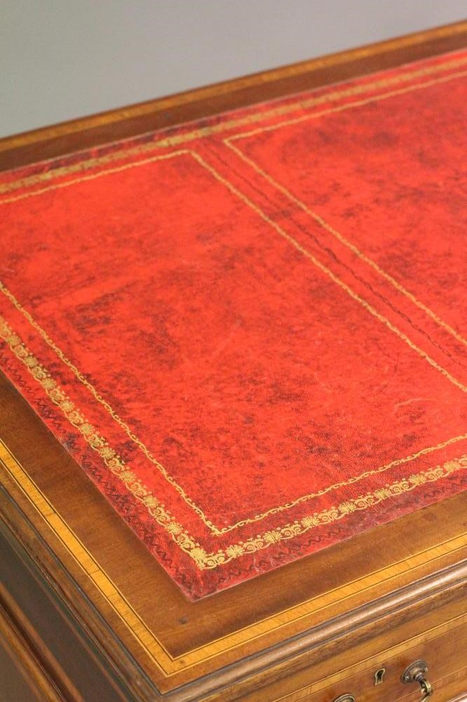 AN EDWARDIAN MAHOGANY PEDESTAL DESK with satinwood banding and stringing Image