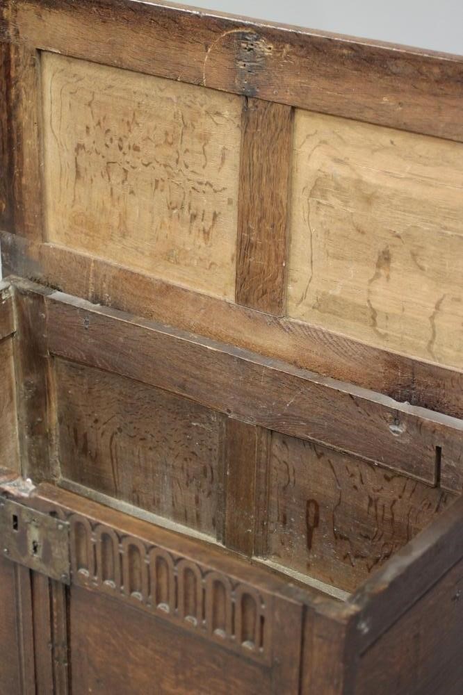 A SMALL OAK PANELLED COFFER Image