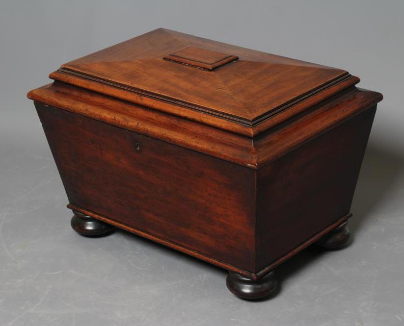A GEORGE IV MAHOGANY CELLARETTE of sarcophagus form Image
