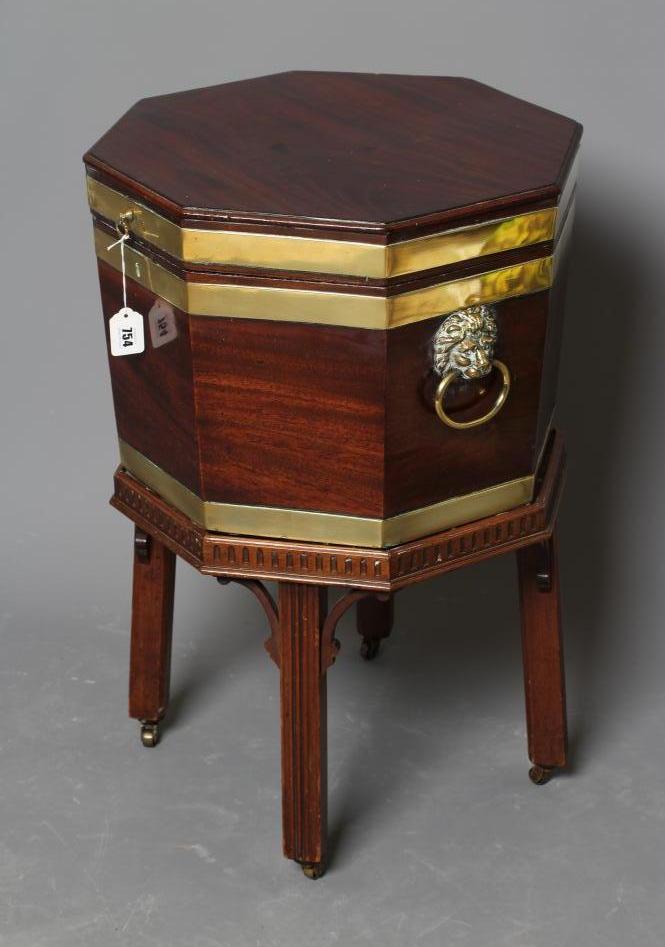 A GEORGIAN MAHOGANY AND BRASS BANDED CELLARETTE Image