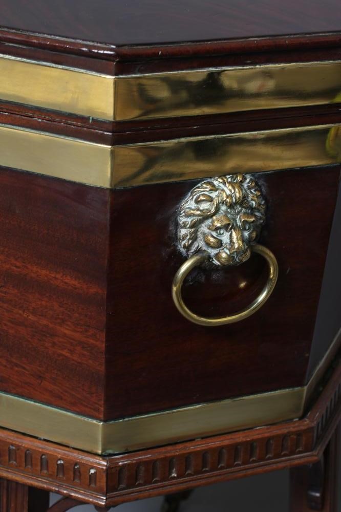 A GEORGIAN MAHOGANY AND BRASS BANDED CELLARETTE Image