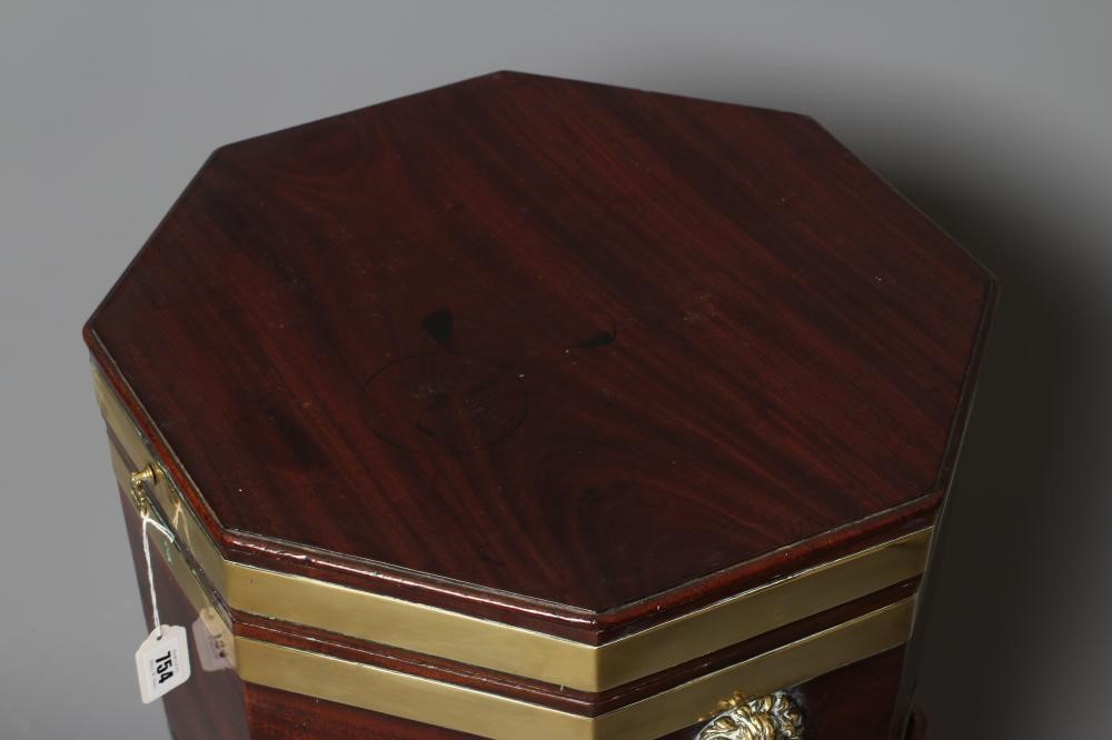 A GEORGIAN MAHOGANY AND BRASS BANDED CELLARETTE Image