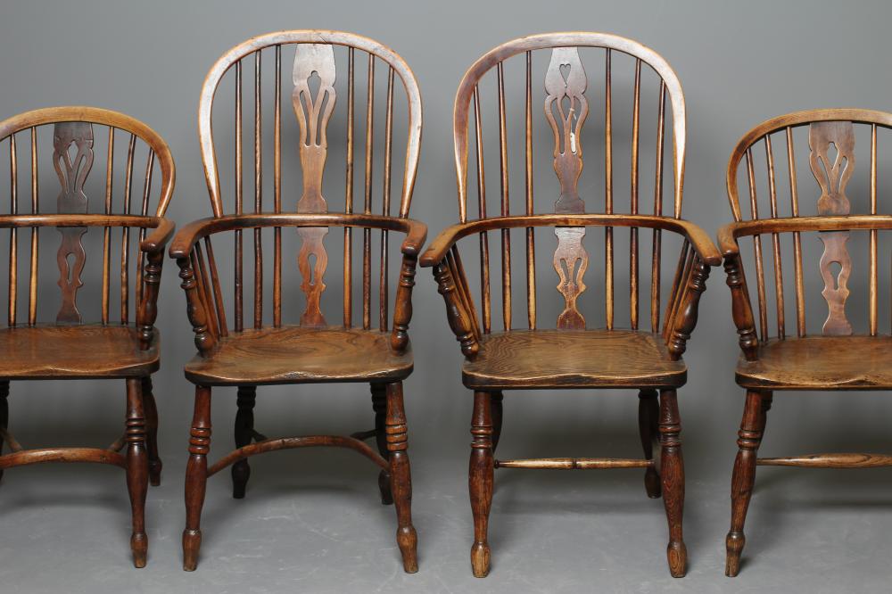A MATCHED SET OF SIX HOOP BACK WINDSOR ARM CHAIRS in ash and elm Image