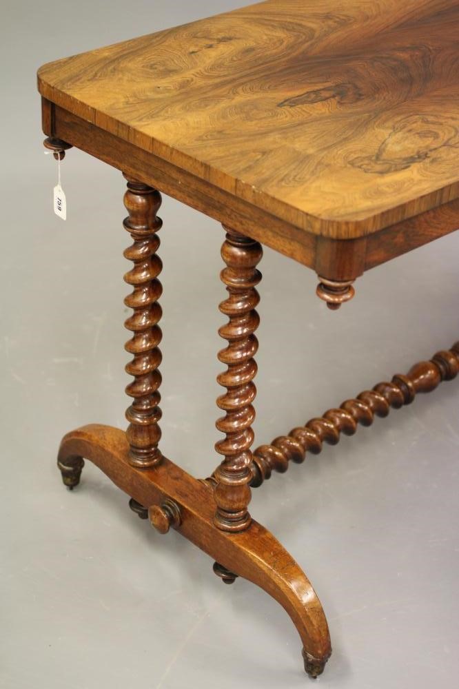 A VICTORIAN ROSEWOOD LIBRARY TABLE Image