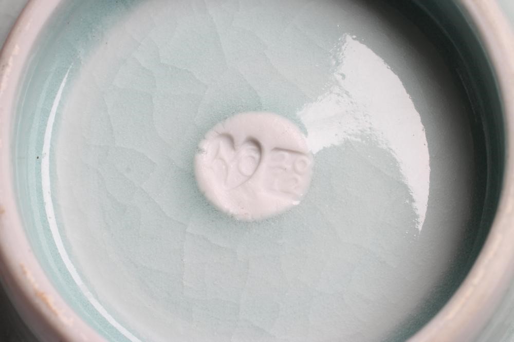 A & J YOUNG (b.1949 and 1950) - a green glazed stoneware box and cover of flared circular form Image