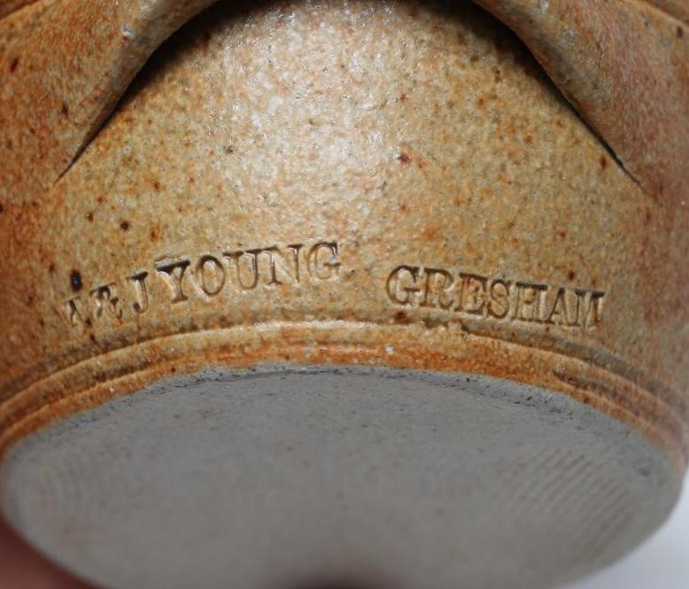 A & J YOUNG (b.1949 and 1950) - a green glazed stoneware box and cover of flared circular form Image