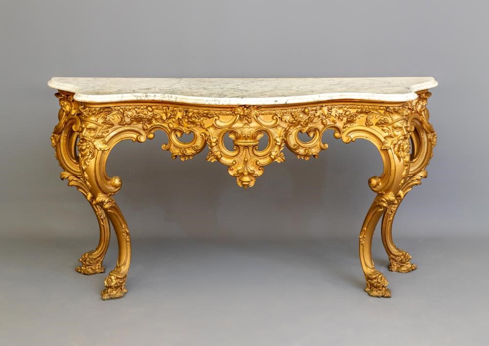 A VICTORIAN CARVED GILT WOOD AND GESSO CONSOLE TABLE Image