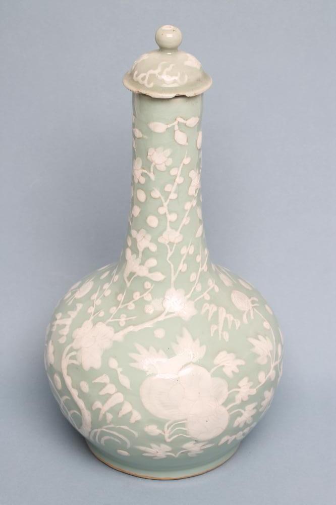 A CHINESE PORCELAIN BOTTLE VASE AND COVER Image