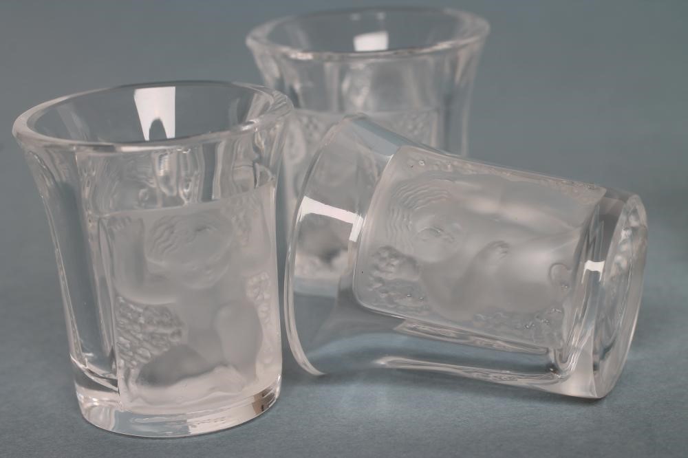 A SET OF FIVE "LES ENFANTS" LALIQUE SHOT GLASSES of slightly flared cylindrical form each with two Image