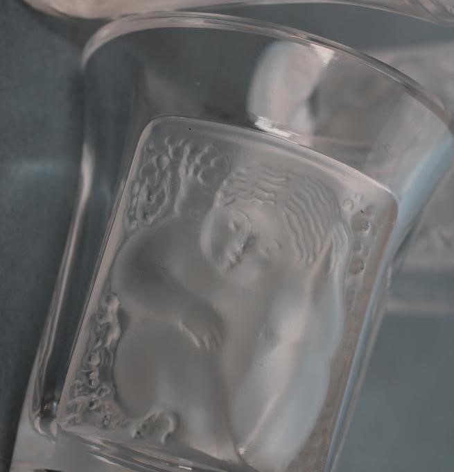 A SET OF FIVE "LES ENFANTS" LALIQUE SHOT GLASSES of slightly flared cylindrical form each with two Image