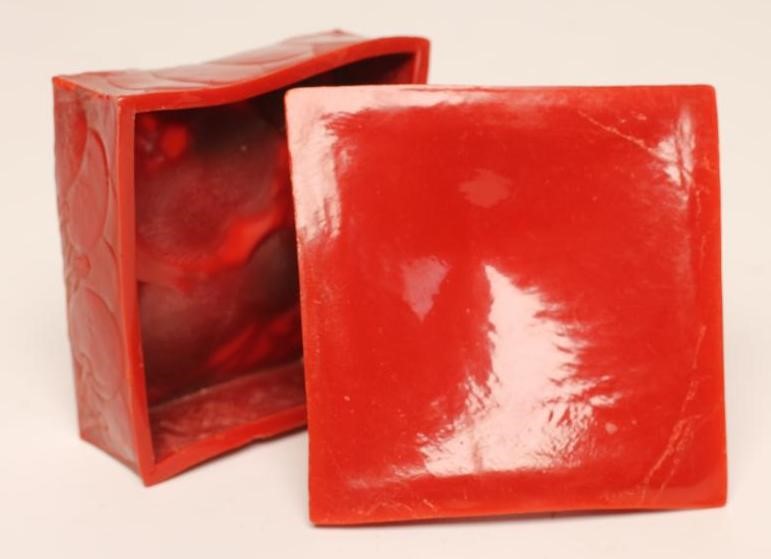 "CERISES" - A LALIQUE CHERRY MOULDED RED BAKELITE DRESSING TABLE BOX AND COVER Image