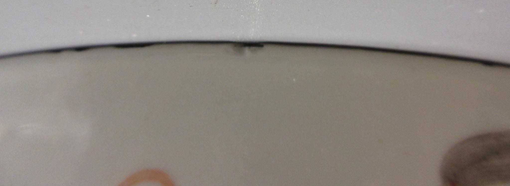 A CHINESE PORCELAIN FAMILLE VERTE BOWL of plain circular form painted with a seated Hotei with Image